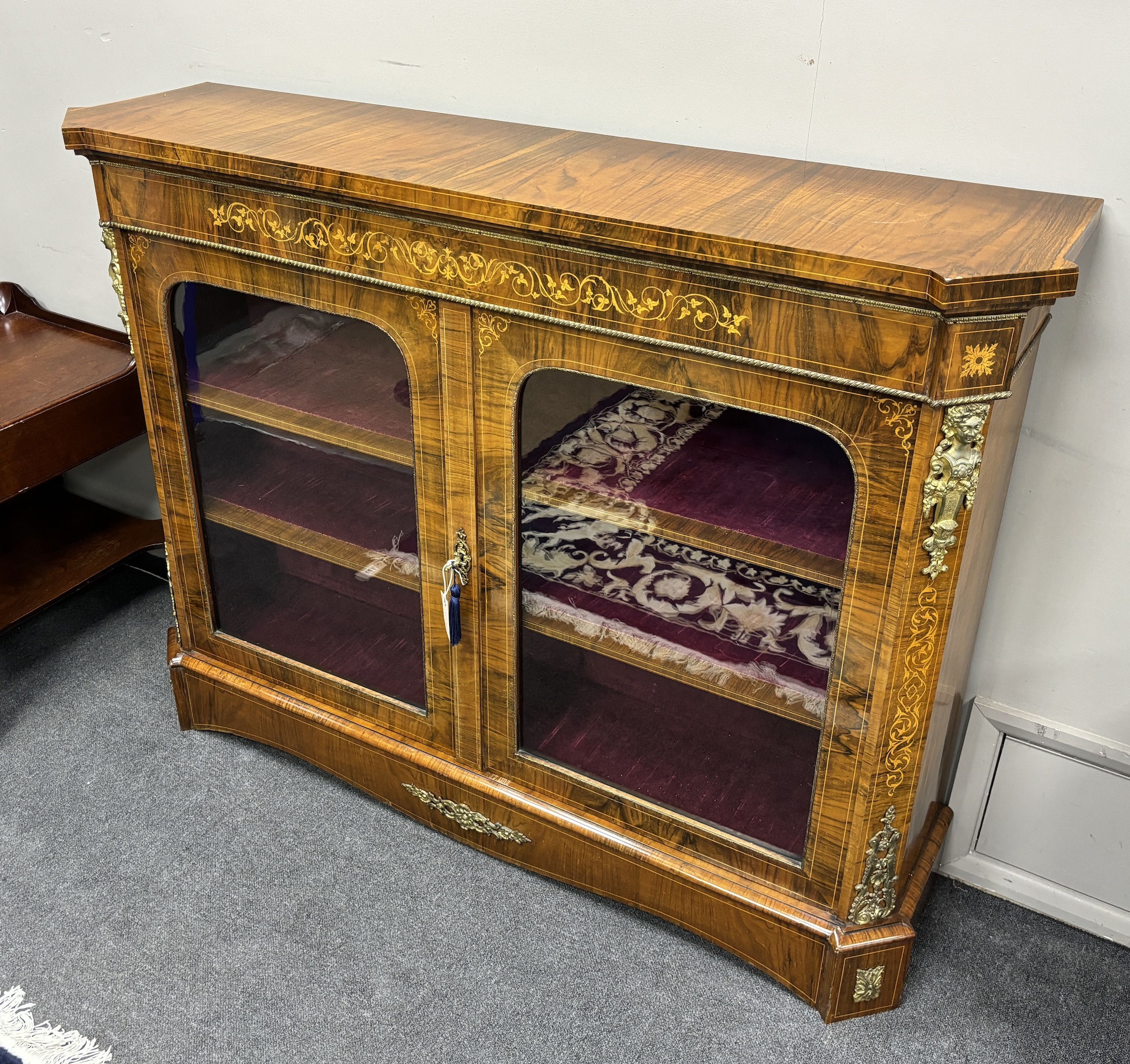 A Victorian figured walnut and marquetry side cabinet, width 143cm, depth 37cm, height 109cm